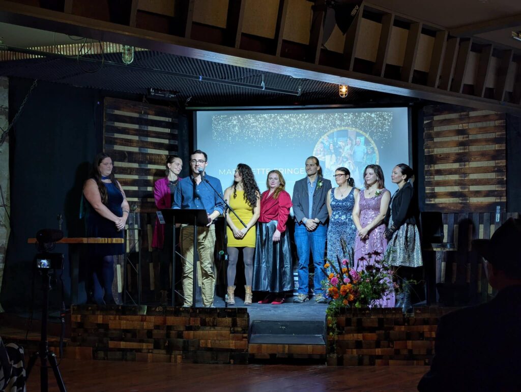 Board Members and Founders of Marquette Fringe accepting the Arts Organization of the Year Award at the City of Marquette Arts and Culture Center's 27th Annual Art Awards held at Ore Dock Brewing Co.